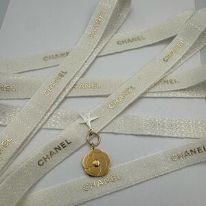 Chanel Camellia holiday charm w/Ribbon